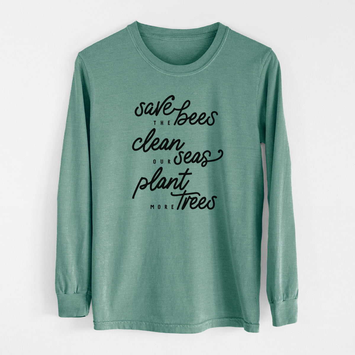 Pine green Comfort Colors long sleeve shirt laid flat, printed with black hand-lettered words reading Save the Bees, Clean Our Seas, Plant More Trees.