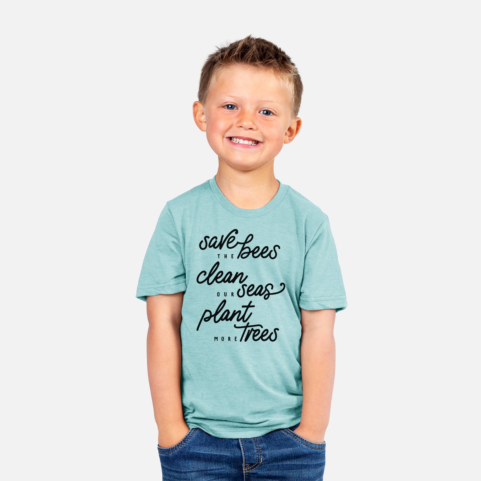Two youth t-shirts in different colors on hangers, printed with black hand-lettered words reading Save the Bees, Clean Our Seas, Plant More Trees.