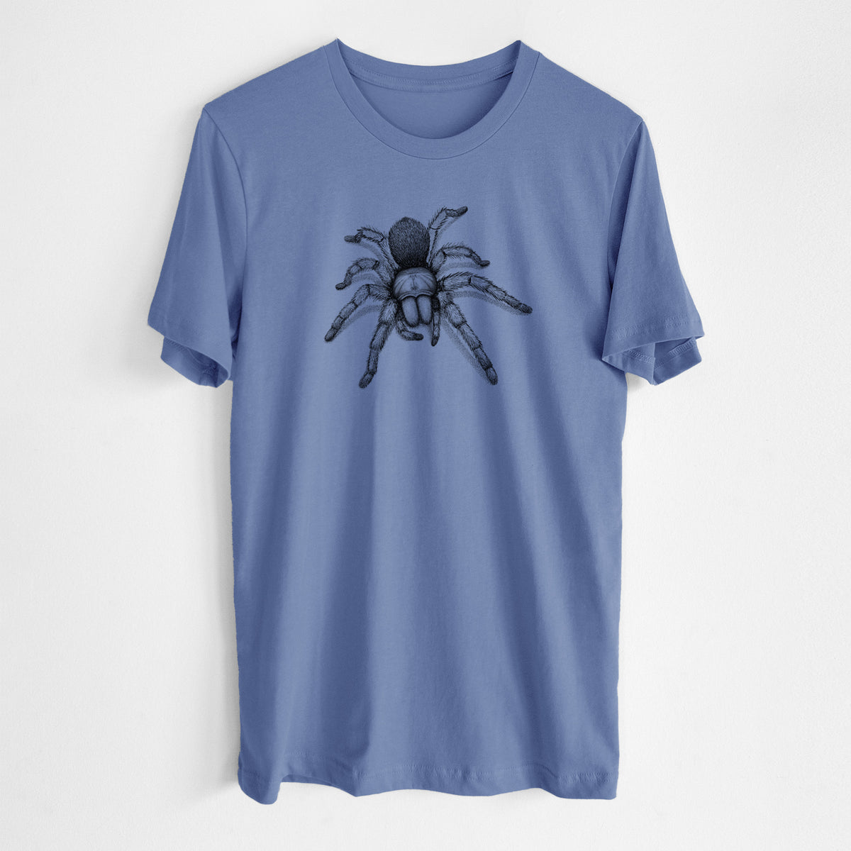 Blue bell lightweight cotton t-shirt laid flat, printed with a detailed black ink illustration of a desert blonde tarantula.