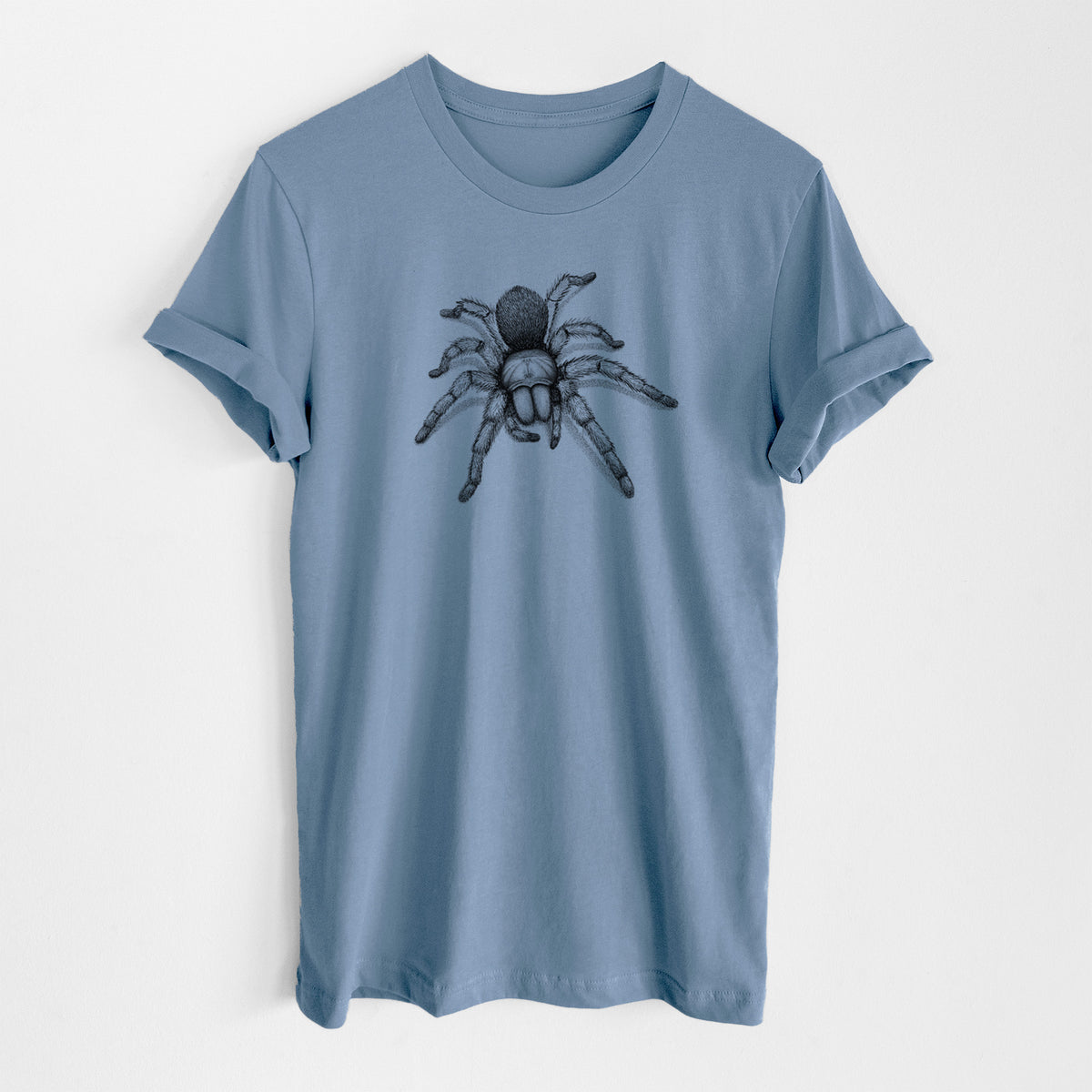 Steel blue lightweight cotton t-shirt laid flat, printed with a detailed black ink illustration of a desert blonde tarantula.