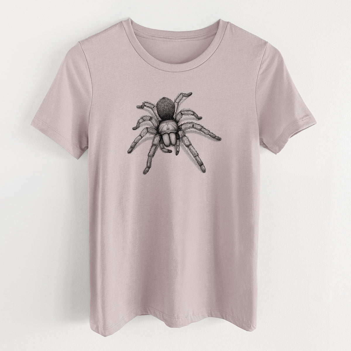 Pink gravel women's relaxed fit cotton t-shirt laid flat, printed with a detailed black ink illustration of a desert blonde tarantula.
