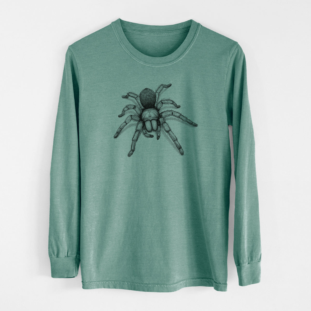 Pine green Comfort Colors long sleeve shirt laid flat, printed with a detailed black ink illustration of a desert blonde tarantula.