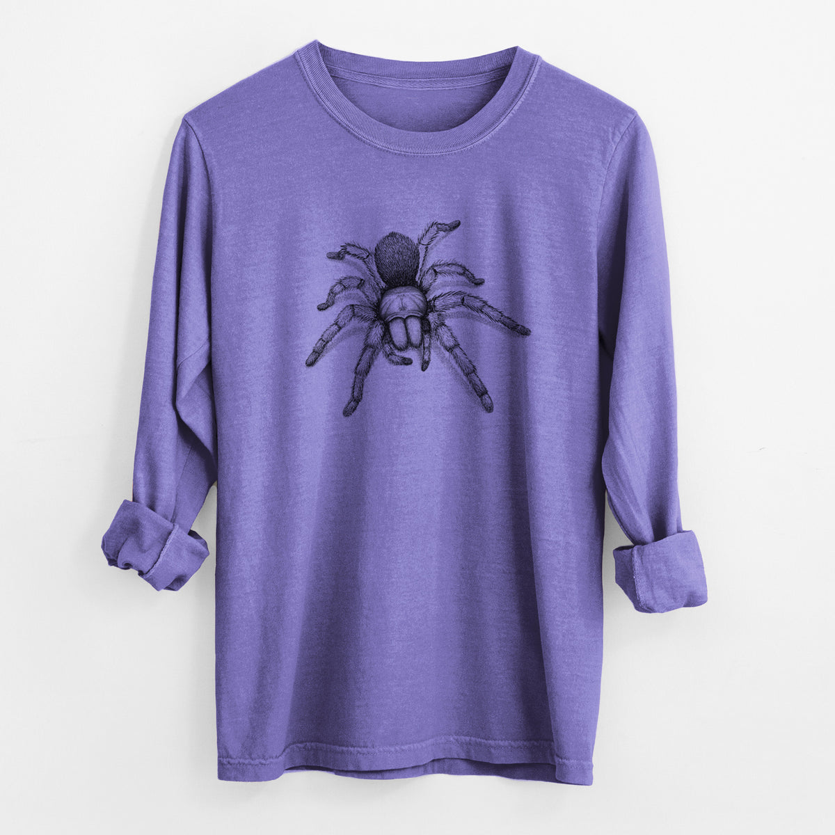 Violet purple Comfort Colors long sleeve shirt laid flat with the cuffs rolled, printed with a detailed black ink illustration of a desert blonde tarantula.