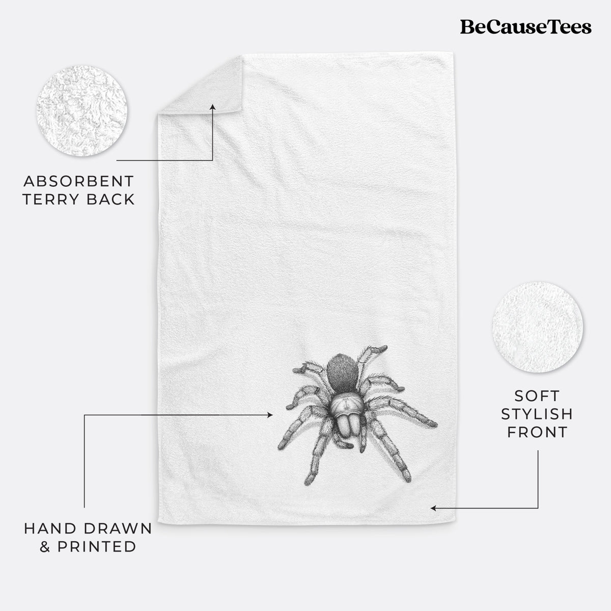 White hand towel printed with a detailed black ink illustration of a desert blonde tarantula.