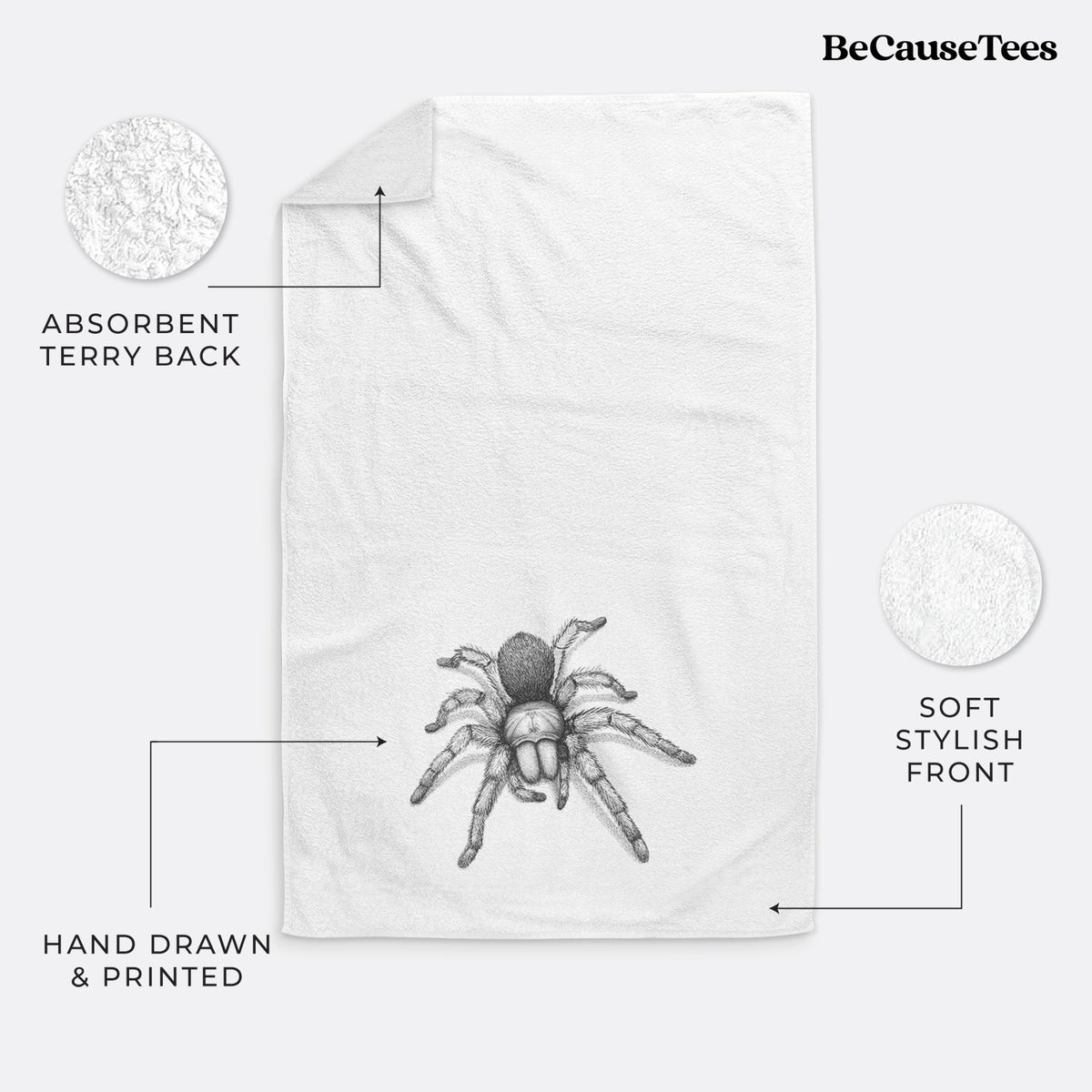 White hand towel printed with a detailed black ink illustration of a desert blonde tarantula.