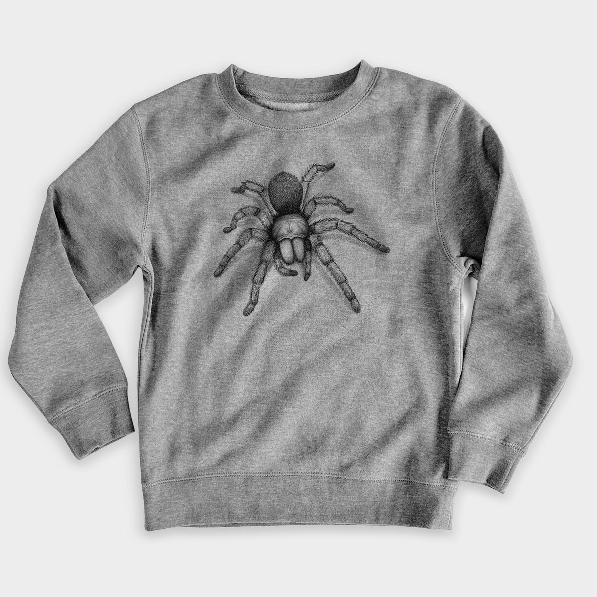 Nickel grey youth crewneck sweatshirt laid flat, printed with a detailed black ink illustration of a desert blonde tarantula.
