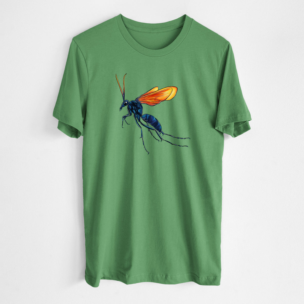 Leaf green lightweight cotton t-shirt laid flat, printed with a full-color illustration of a tarantula hawk wasp with a blue body and orange wings.
