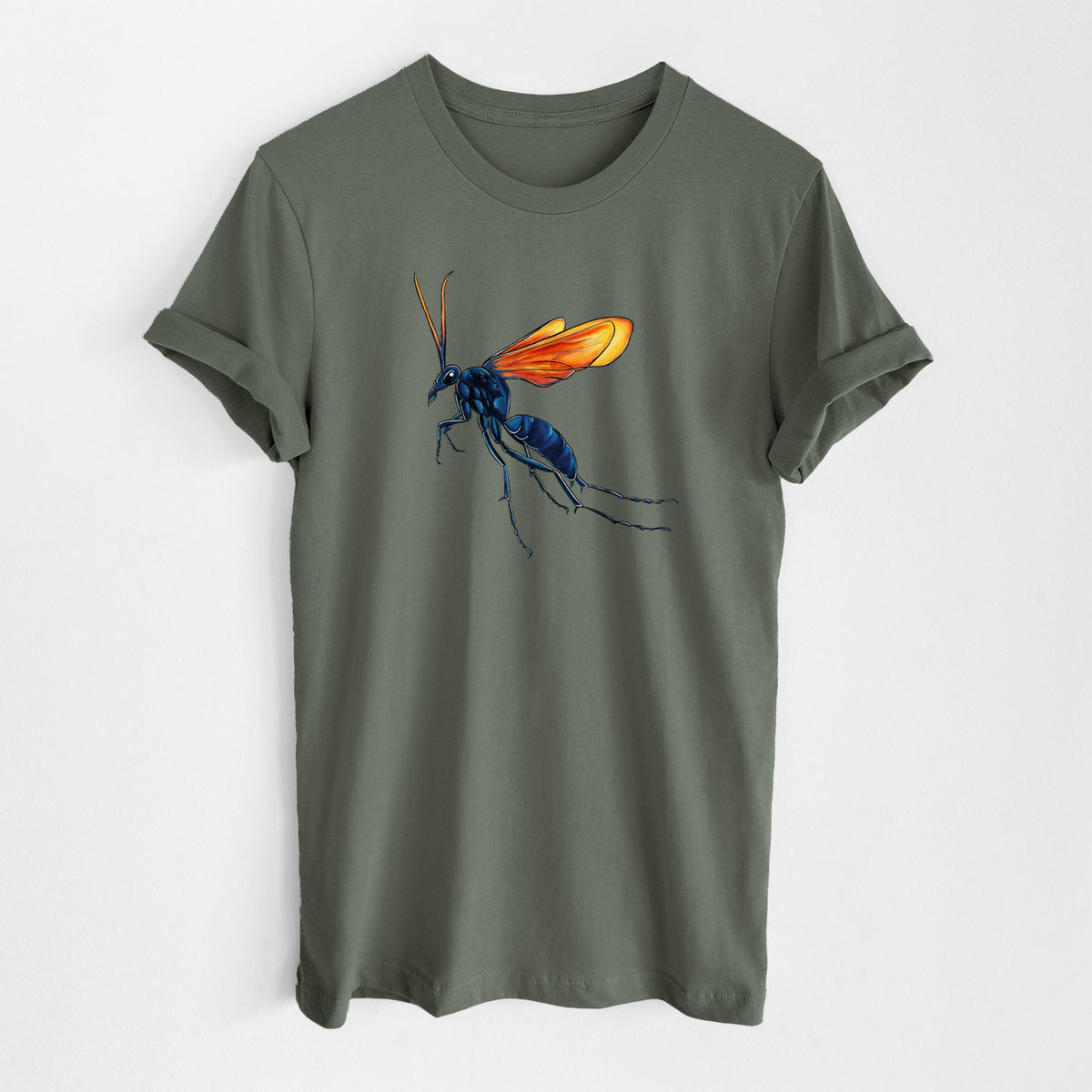Military green lightweight cotton t-shirt laid flat, printed with a full-color illustration of a tarantula hawk wasp with a blue body and orange wings.