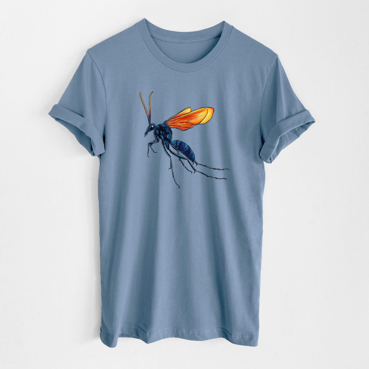 Steel blue lightweight cotton t-shirt laid flat, printed with a full-color illustration of a tarantula hawk wasp with a blue body and orange wings.