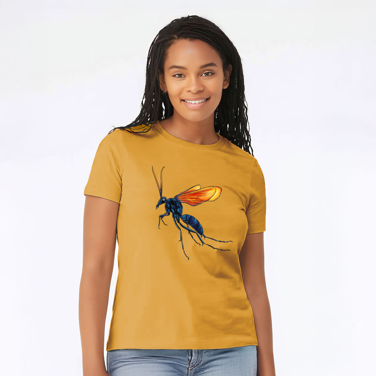 Woman wearing a honeycomb yellow women's relaxed fit cotton t-shirt printed with a full-color illustration of a tarantula hawk wasp with a blue body and orange wings.