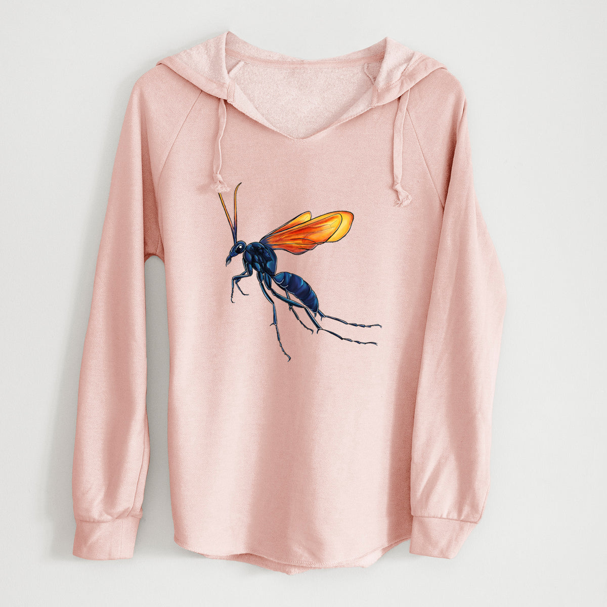 Blush pink women's Cali Wave hooded sweatshirt laid flat, printed with a full-color illustration of a tarantula hawk wasp with a blue body and orange wings.