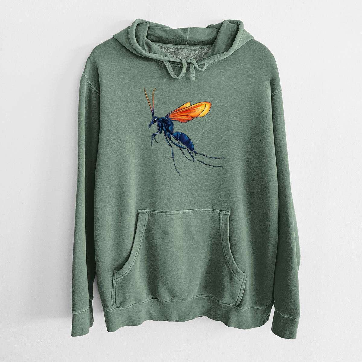 Alpine green pigment dyed hoodie laid flat, printed with a full-color illustration of a tarantula hawk wasp with a blue body and orange wings.