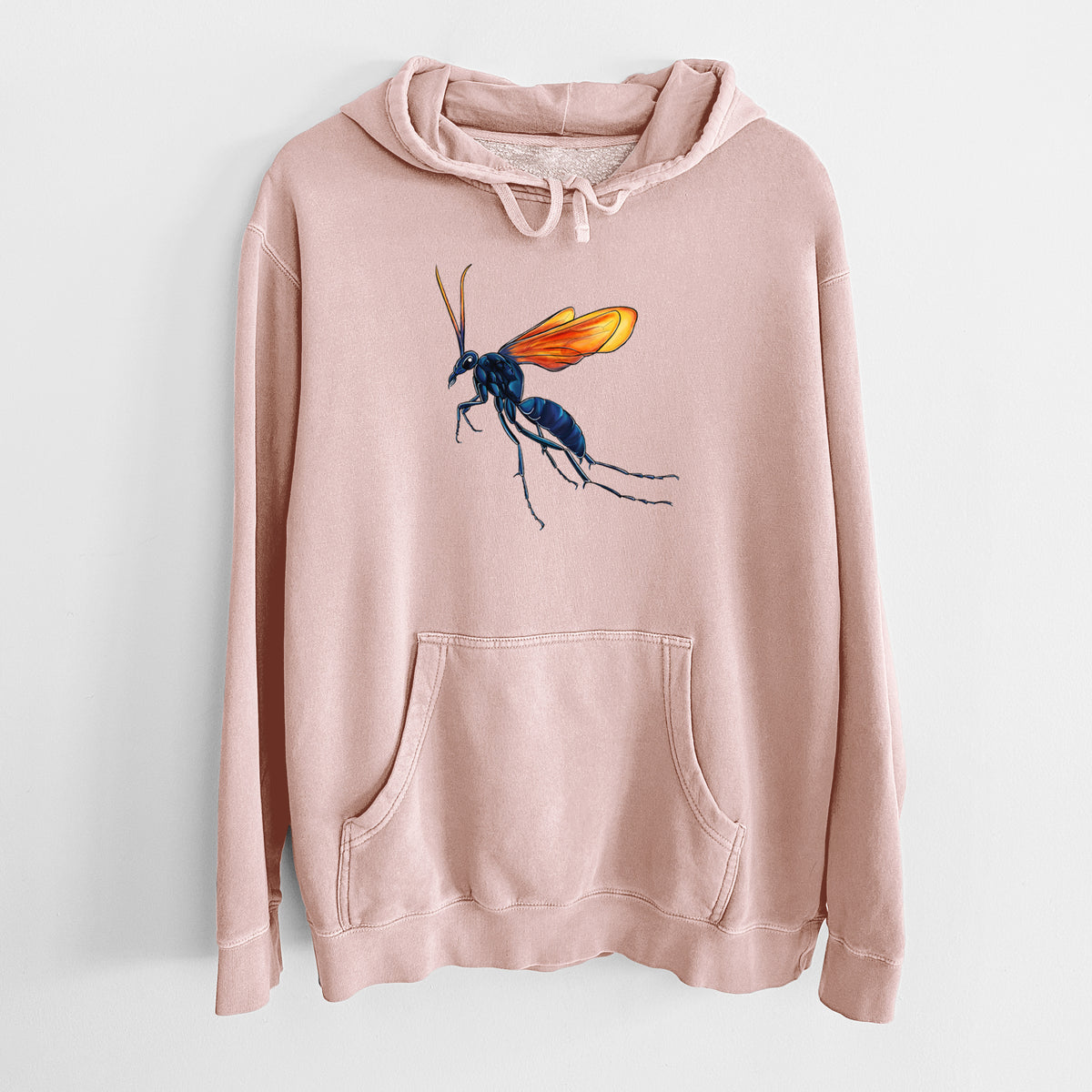 Dusty pink pigment dyed hoodie laid flat, printed with a full-color illustration of a tarantula hawk wasp with a blue body and orange wings.