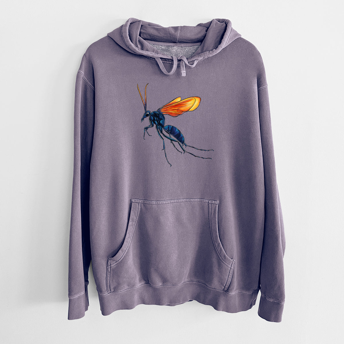 Plum purple pigment dyed hoodie laid flat, printed with a full-color illustration of a tarantula hawk wasp with a blue body and orange wings.