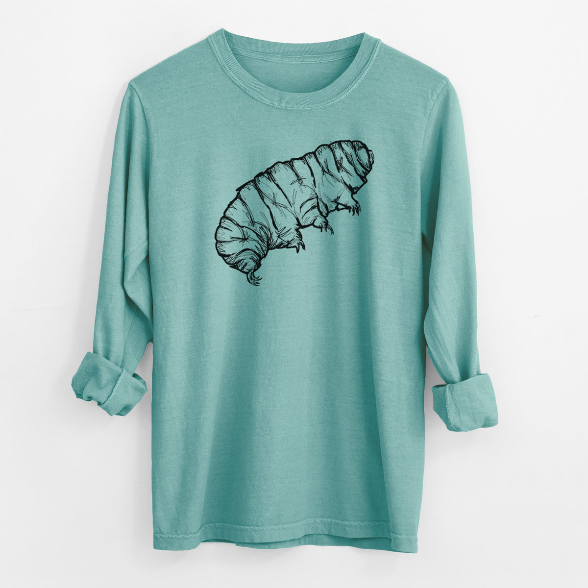 Reef green Comfort Colors long sleeve shirt laid flat with the cuffs rolled, printed with a detailed black ink illustration of a tardigrade, or water bear.