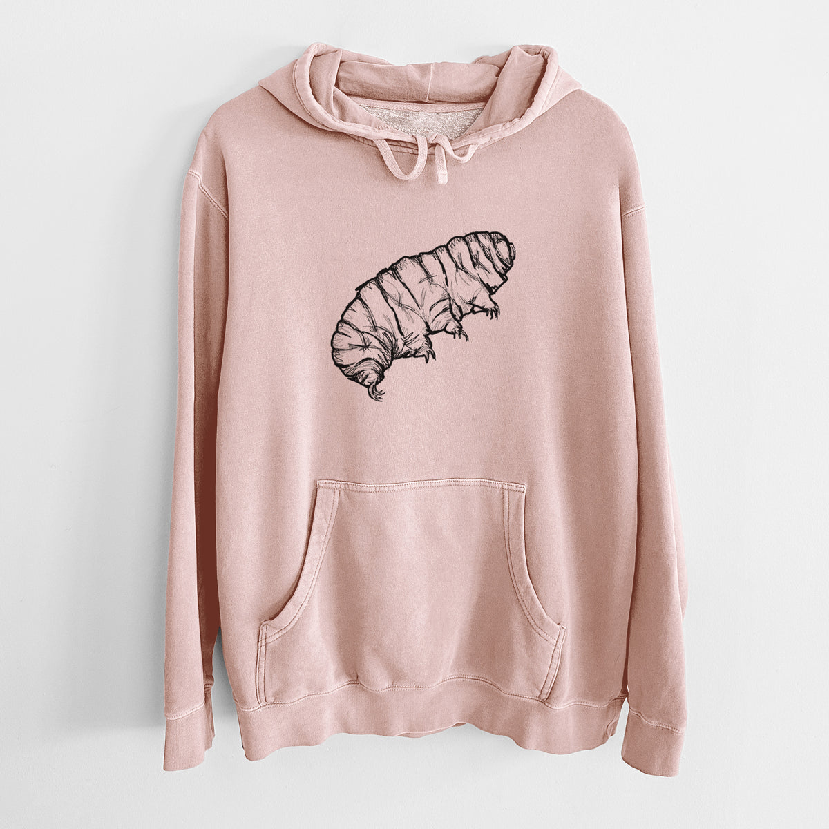 Dusty pink pigment dyed hoodie laid flat, printed with a detailed black ink illustration of a tardigrade, or water bear.