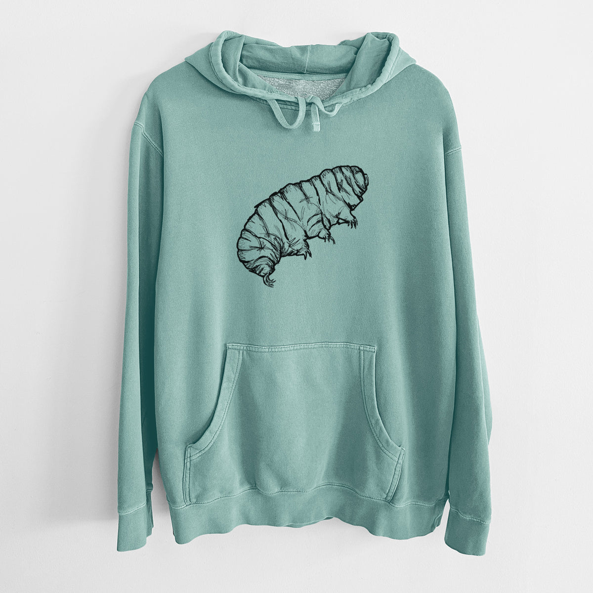 Mint green pigment dyed hoodie laid flat, printed with a detailed black ink illustration of a tardigrade, or water bear.
