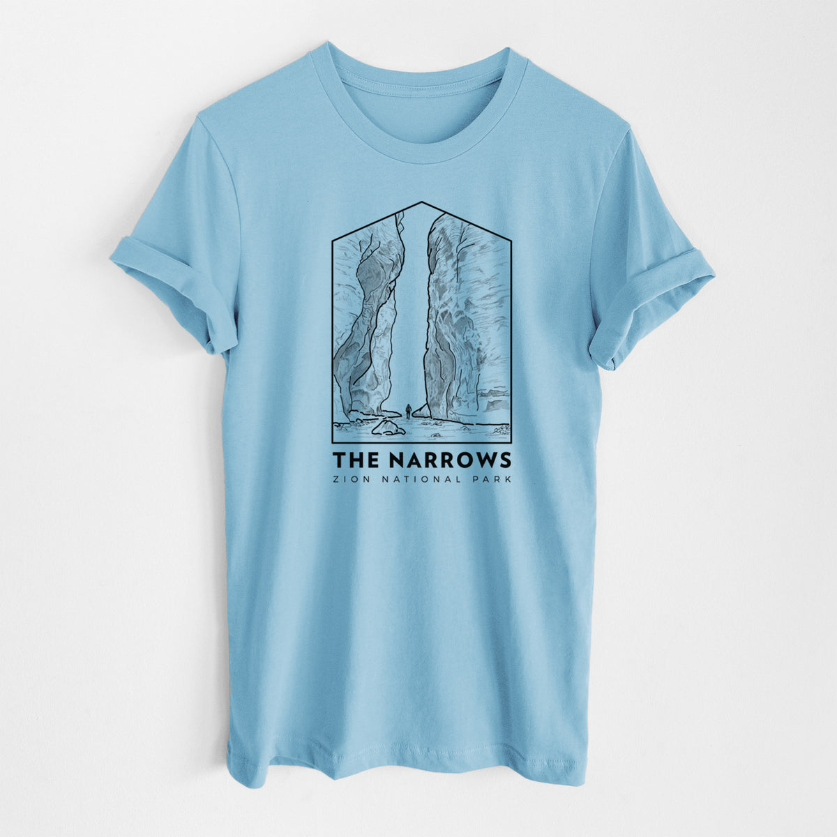 Ocean blue lightweight cotton t-shirt laid flat, printed with a black line art badge of the tall canyon walls of The Narrows, with the words The Narrows.
