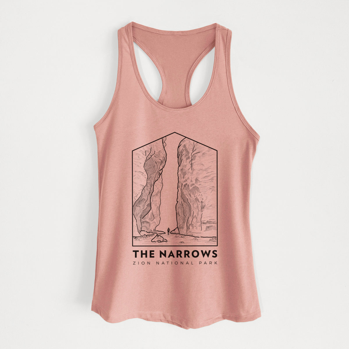 Desert pink women's racerback tank top laid flat, printed with a black line art badge of the tall canyon walls of The Narrows, with the words The Narrows.
