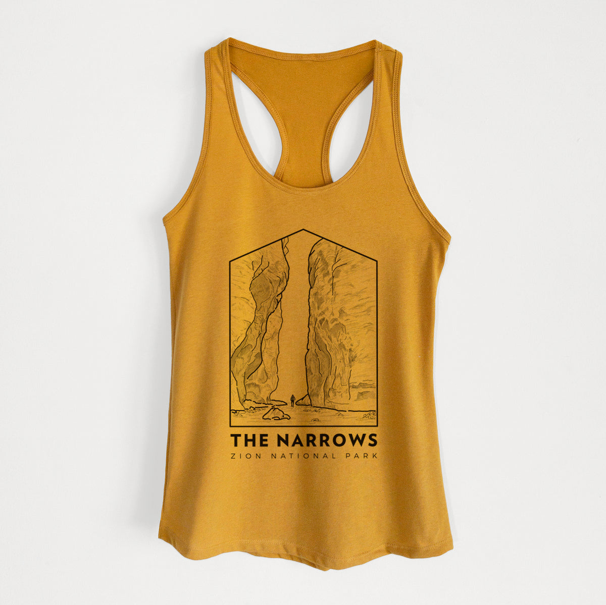 Gold women's racerback tank top laid flat, printed with a black line art badge of the tall canyon walls of The Narrows, with the words The Narrows.