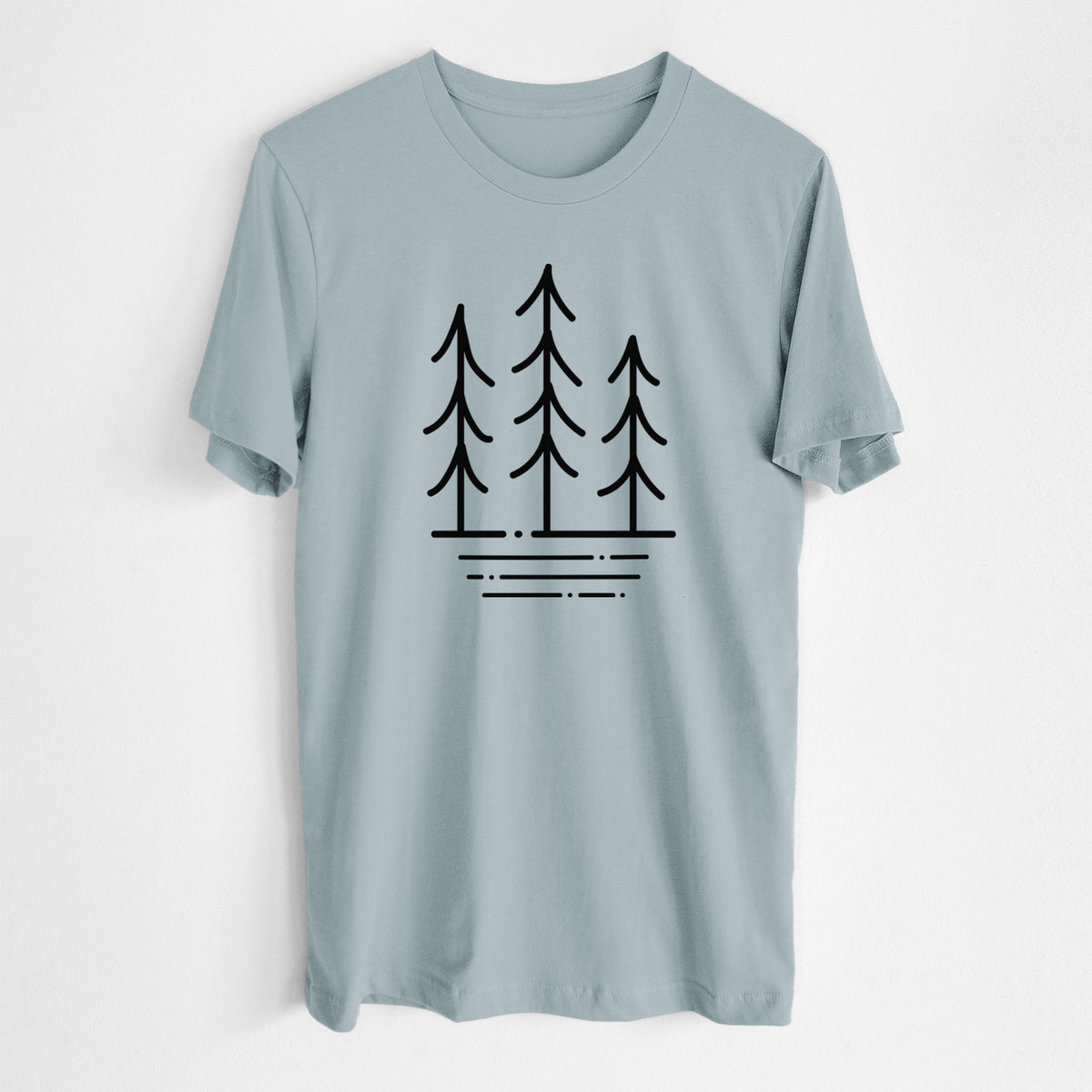 Vintage denim lightweight cotton t-shirt laid flat, printed with black line art of three simple pine trees above horizontal lines.