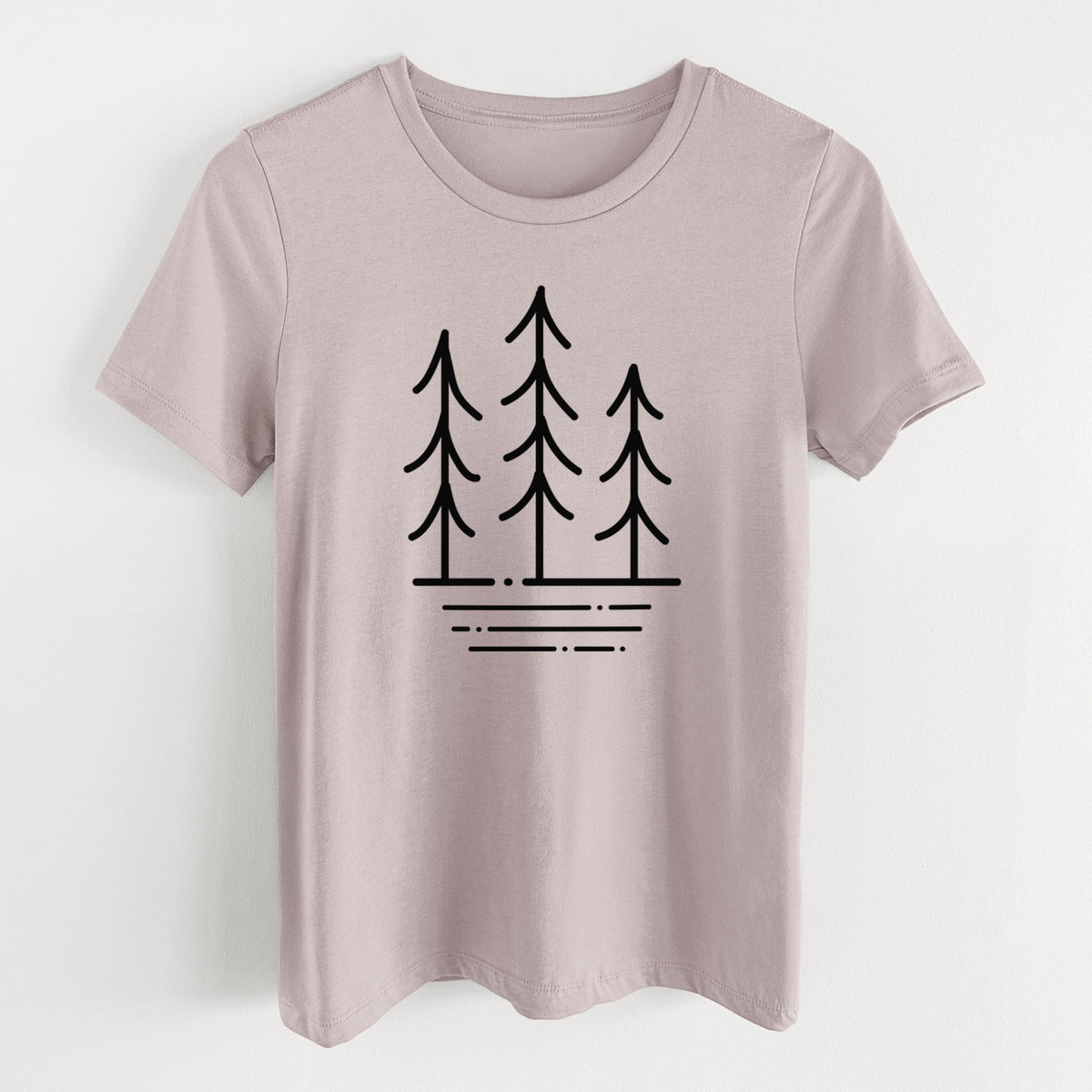Pink gravel women's relaxed fit cotton t-shirt laid flat, printed with black line art of three simple pine trees above horizontal lines.