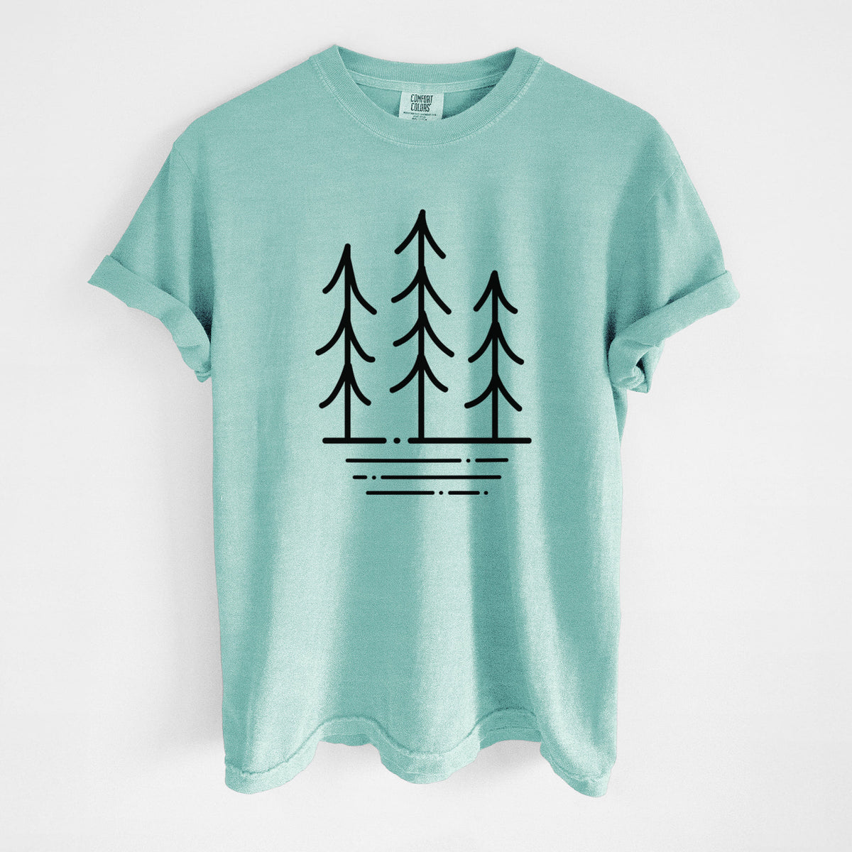 Chalky mint Comfort Colors t-shirt laid flat, printed with black line art of three simple pine trees above horizontal lines.