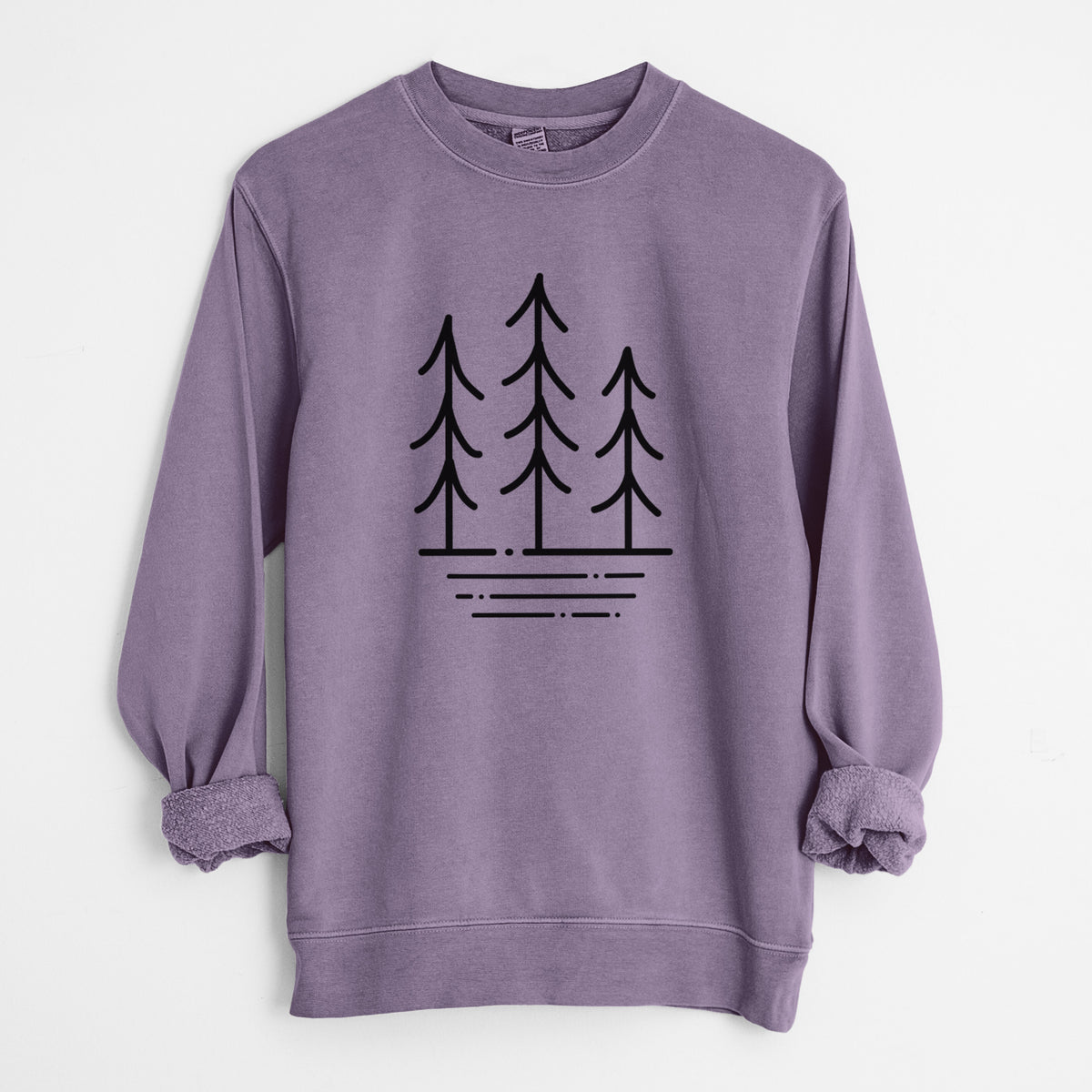 Plum purple pigment dyed crewneck sweatshirt laid flat with the sleeves rolled, printed with black line art of three simple pine trees above horizontal lines.