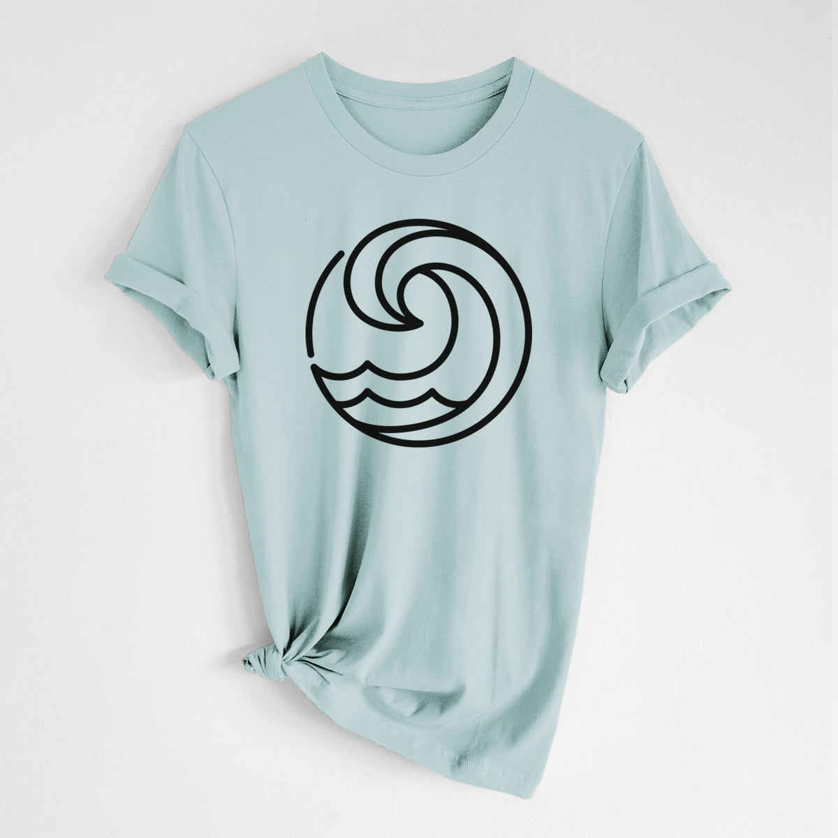 Dusty blue lightweight cotton t-shirt laid flat with the sleeves rolled, printed with a bold black line art circle of a curling ocean wave.