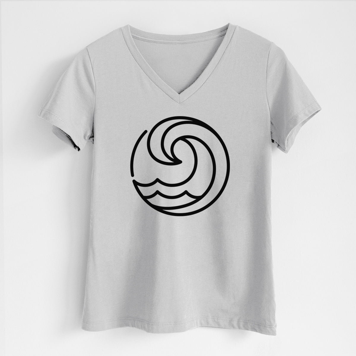 Lunar grey women's relaxed fit cotton V-neck t-shirt laid flat, printed with a bold black line art circle of a curling ocean wave.