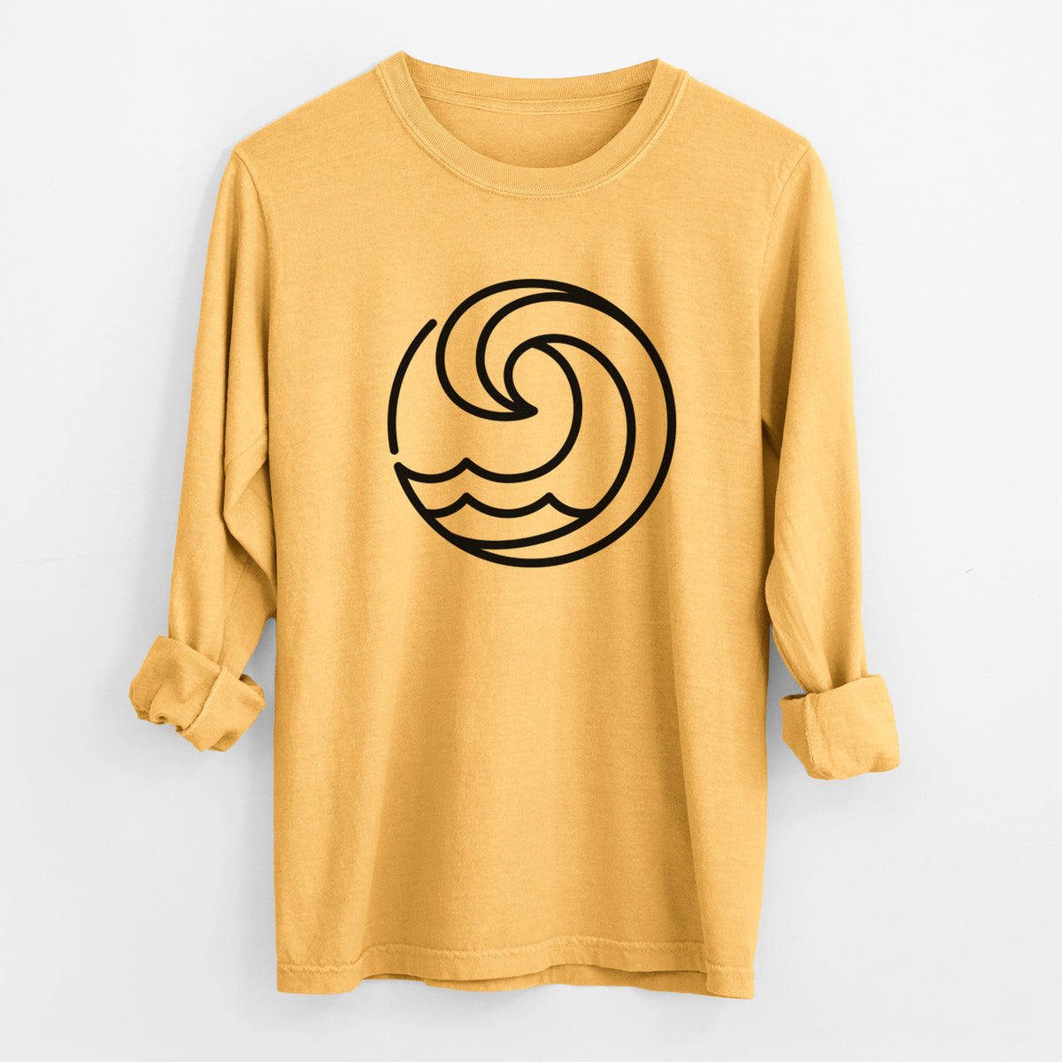Golden wheat yellow Comfort Colors long sleeve shirt laid flat with the cuffs rolled, printed with a bold black line art circle of a curling ocean wave.