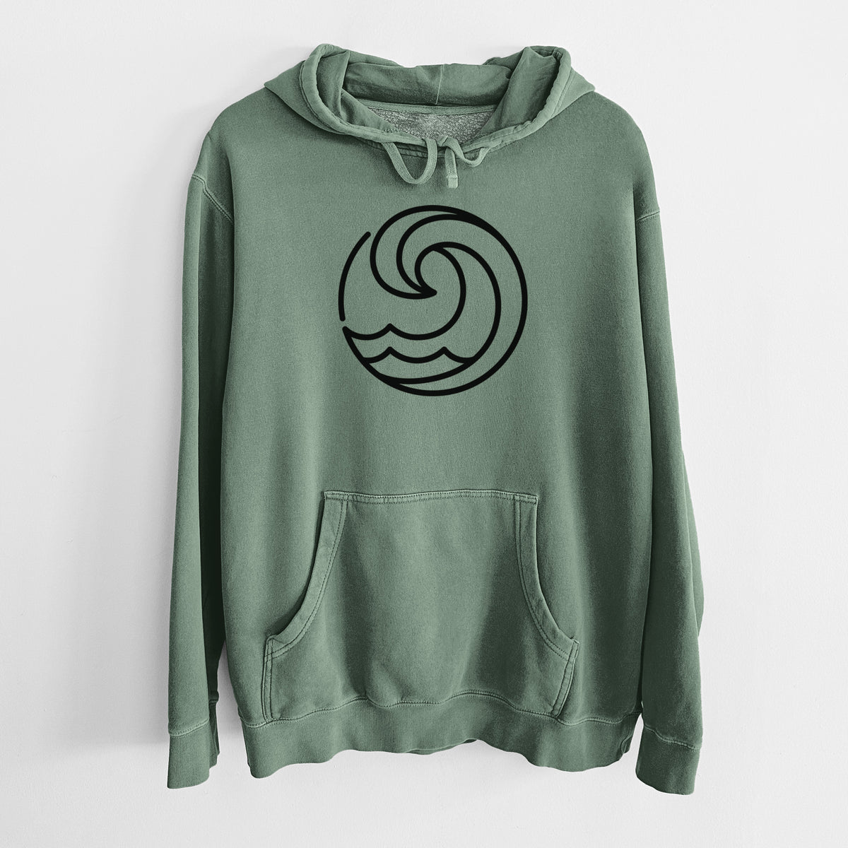 Alpine green pigment dyed hoodie laid flat, printed with a bold black line art circle of a curling ocean wave.