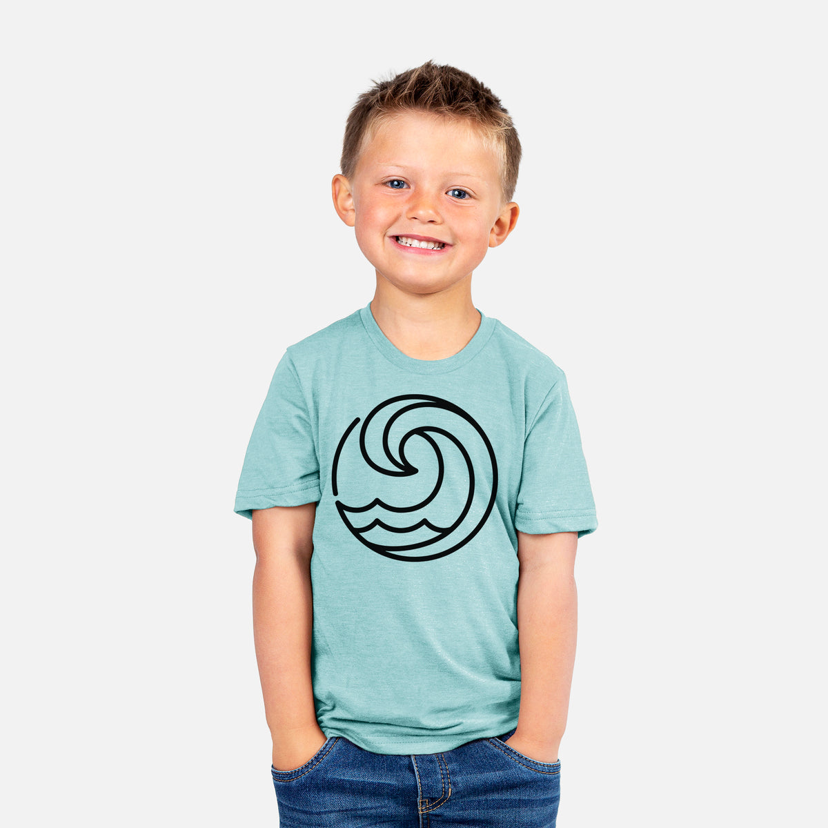 Smiling boy wearing a youth t-shirt printed with a bold black line art circle of a curling ocean wave.