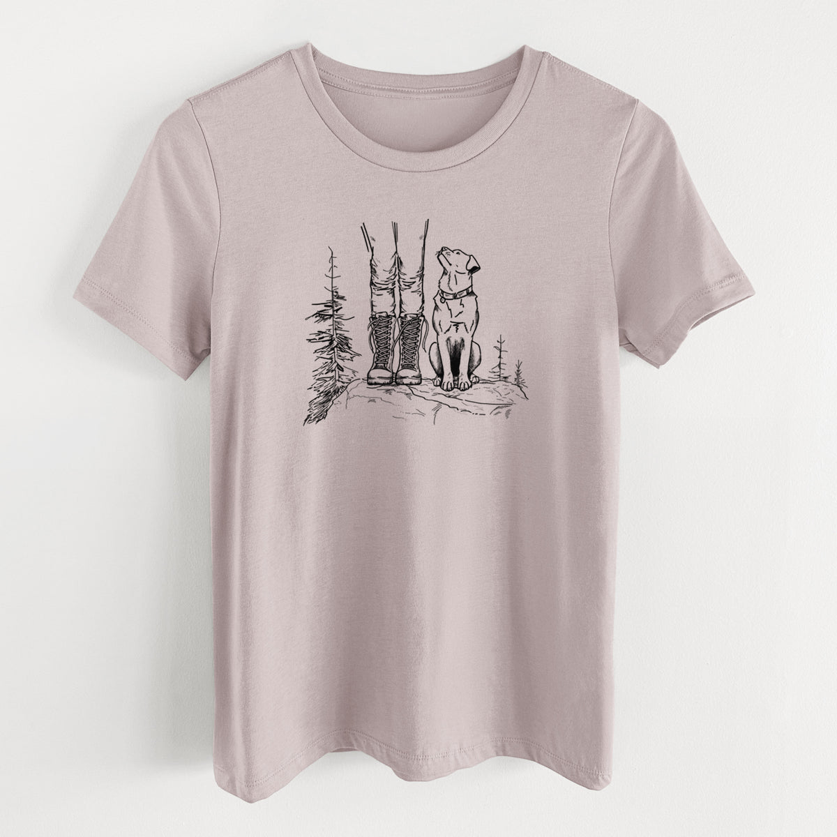 Pink gravel women's relaxed fit cotton t-shirt laid flat, printed with a black ink illustration of a hiker in boots and a dog sitting side by side on a forest trail, seen from behind.