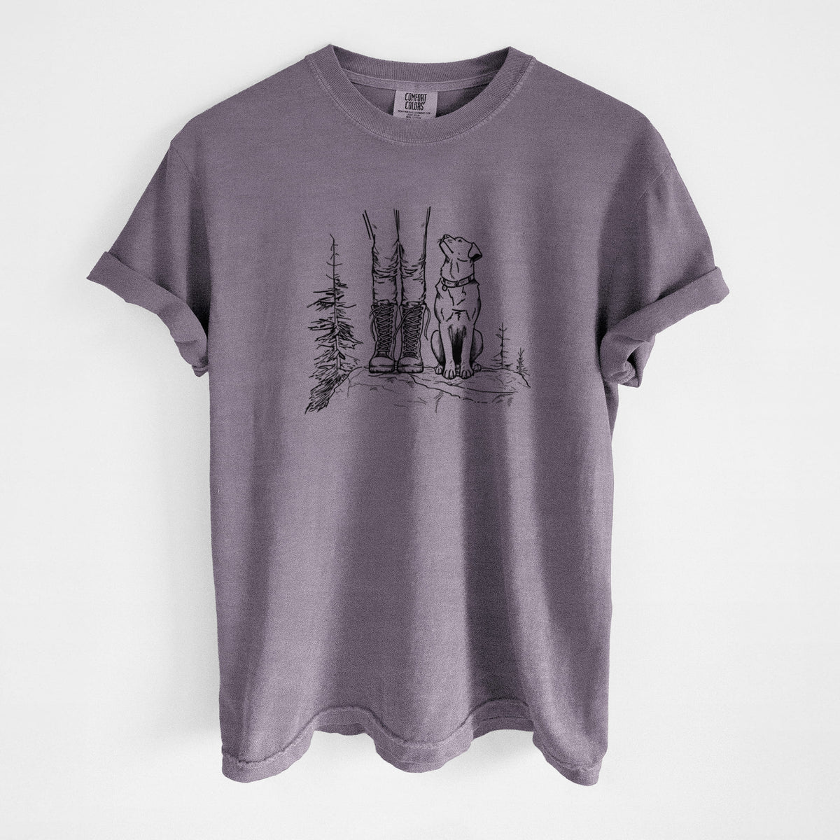 Wine red Comfort Colors t-shirt laid flat, printed with a black ink illustration of a hiker in boots and a dog sitting side by side on a forest trail, seen from behind.