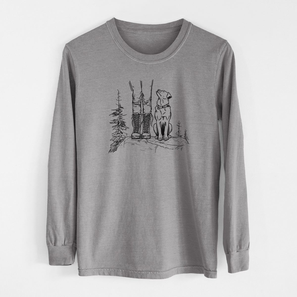 Grey Comfort Colors long sleeve shirt laid flat, printed with a black ink illustration of a hiker in boots and a dog sitting side by side on a forest trail, seen from behind.