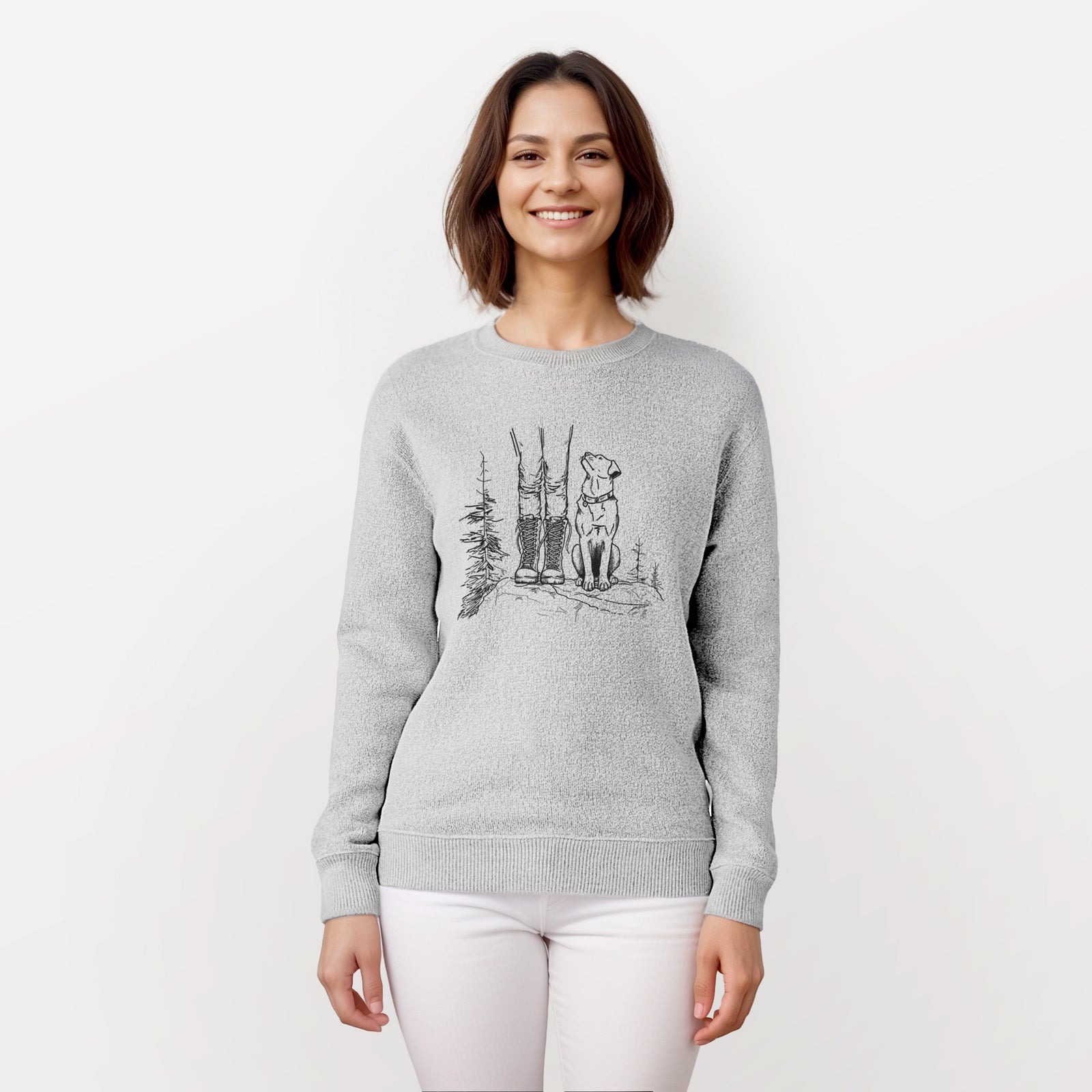 Salt and pepper knit sweatshirt laid flat, printed with a black ink illustration of a hiker in boots and a dog sitting side by side on a forest trail, seen from behind.