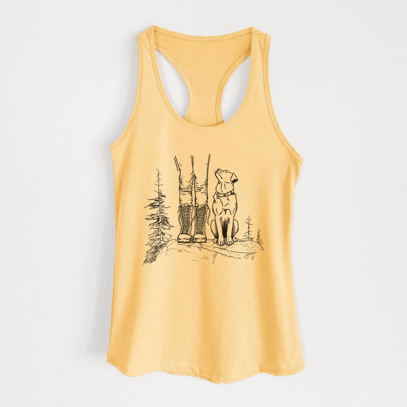 Banana cream women's racerback tank top laid flat, printed with a black ink illustration of a hiker in boots and a dog sitting side by side on a forest trail, seen from behind.