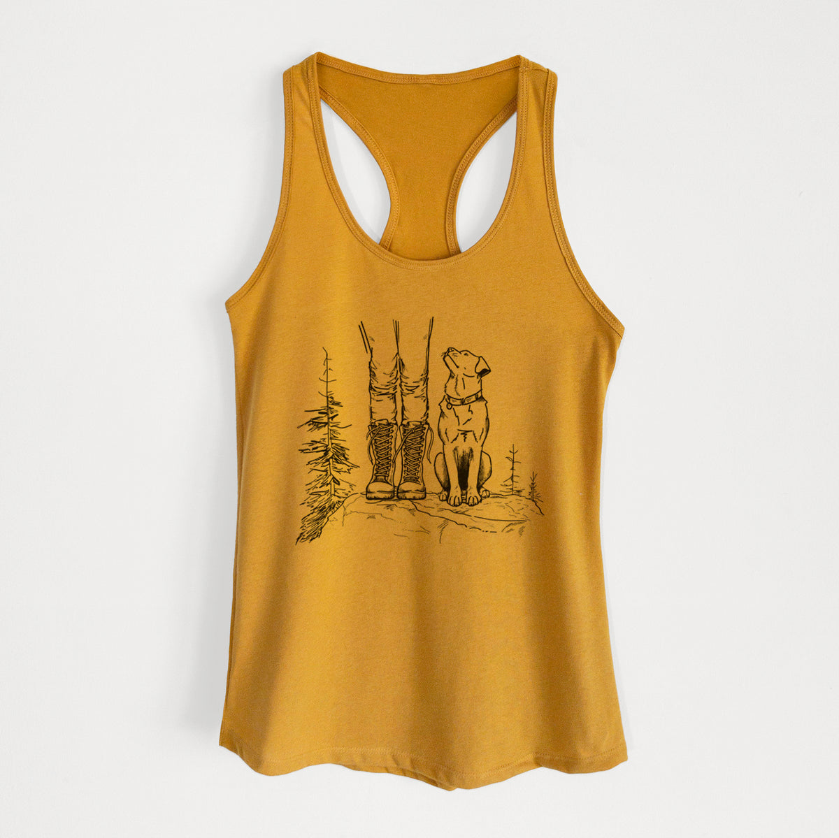 Gold women's racerback tank top laid flat, printed with a black ink illustration of a hiker in boots and a dog sitting side by side on a forest trail, seen from behind.