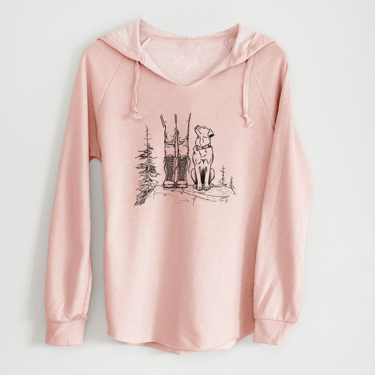 Blush pink women's Cali Wave hooded sweatshirt laid flat, printed with a black ink illustration of a hiker in boots and a dog sitting side by side on a forest trail, seen from behind.