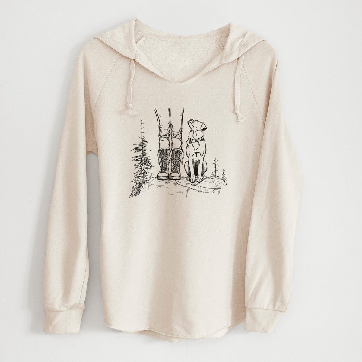 Bone cream women's Cali Wave hooded sweatshirt laid flat, printed with a black ink illustration of a hiker in boots and a dog sitting side by side on a forest trail, seen from behind.