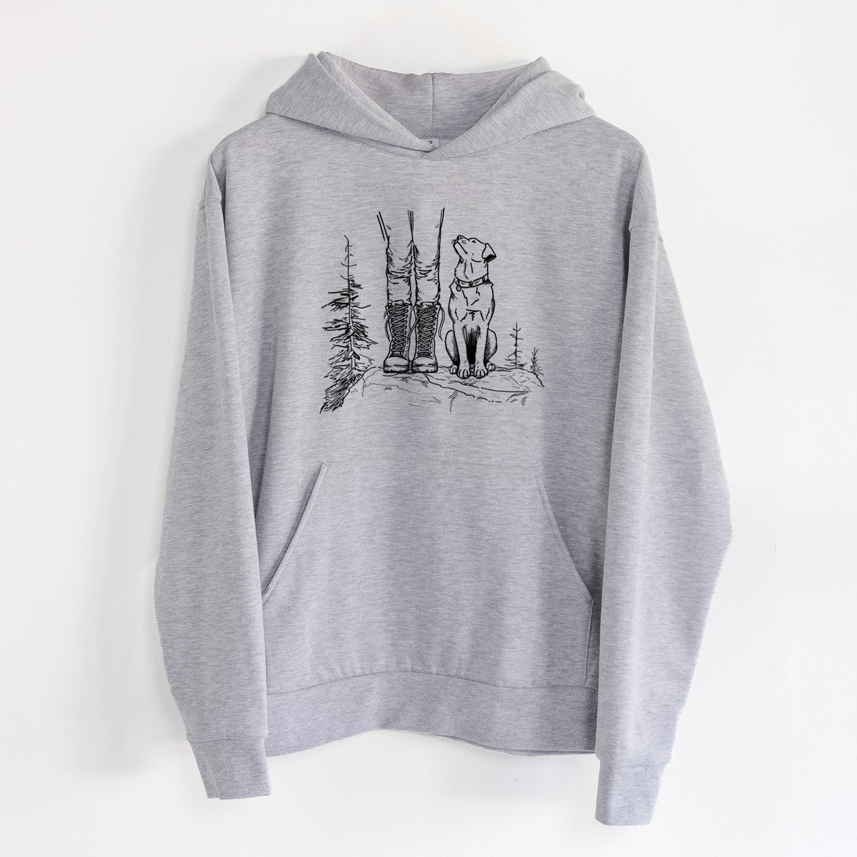 Trail Companions - Hiking with Dogs - Statement Midweight Hoodie in Heather Grey, hanging on a white wall, with a front kangaroo pocket and no drawcords.