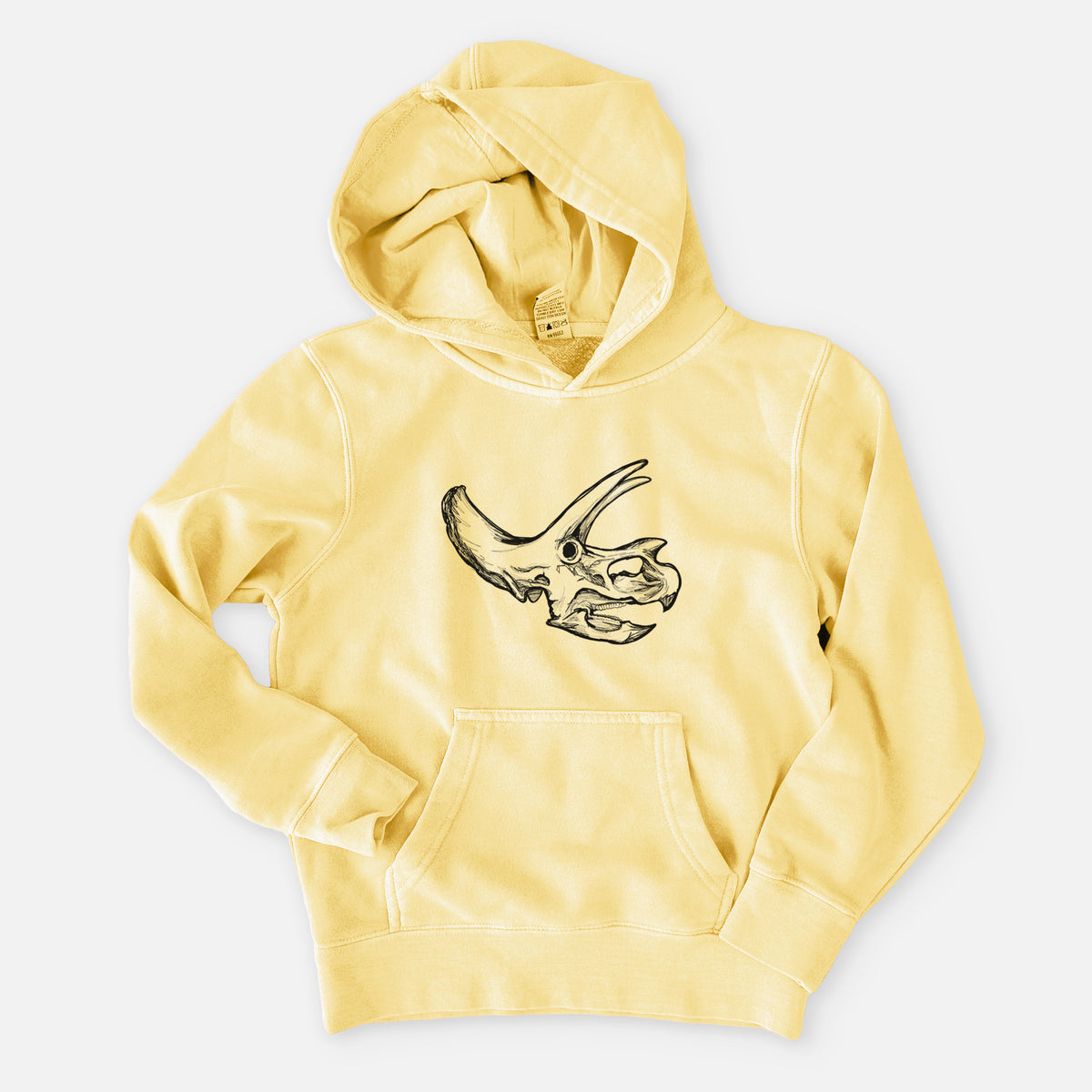 Pigment yellow youth pigment dyed hoodie laid flat, printed with a detailed black ink illustration of a Triceratops skull with its horns and frill.