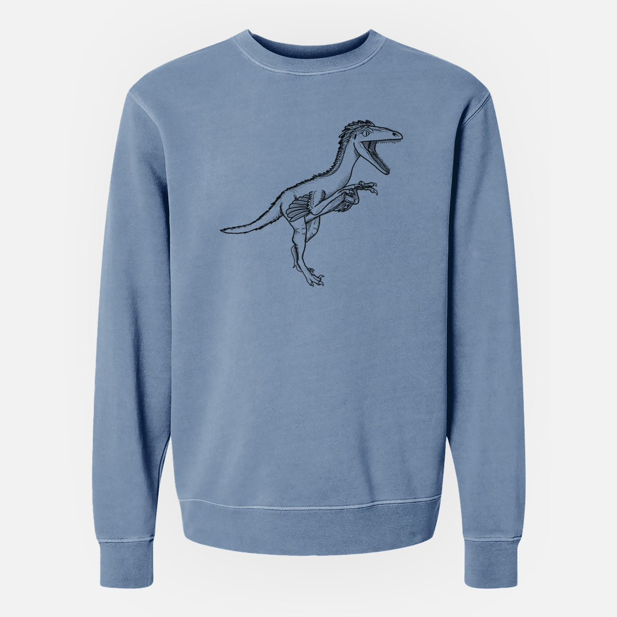 Slate blue pigment dyed crewneck sweatshirt laid flat, printed with a black ink illustration of a Troodon dinosaur running.