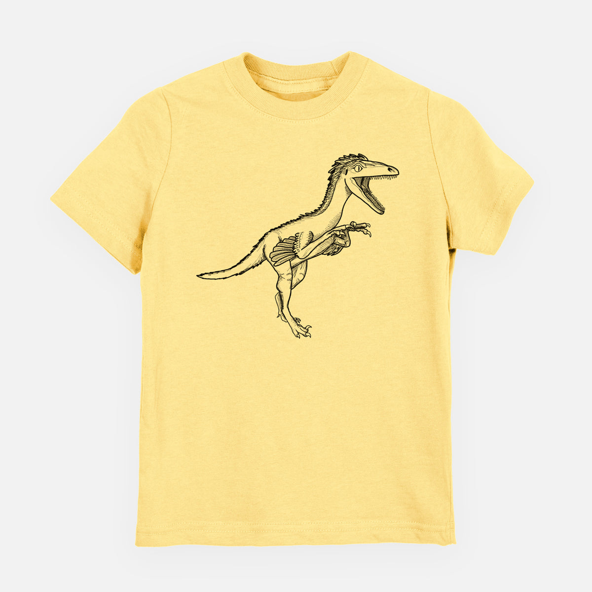 Butter yellow youth t-shirt laid flat, printed with a black ink illustration of a Troodon dinosaur running.