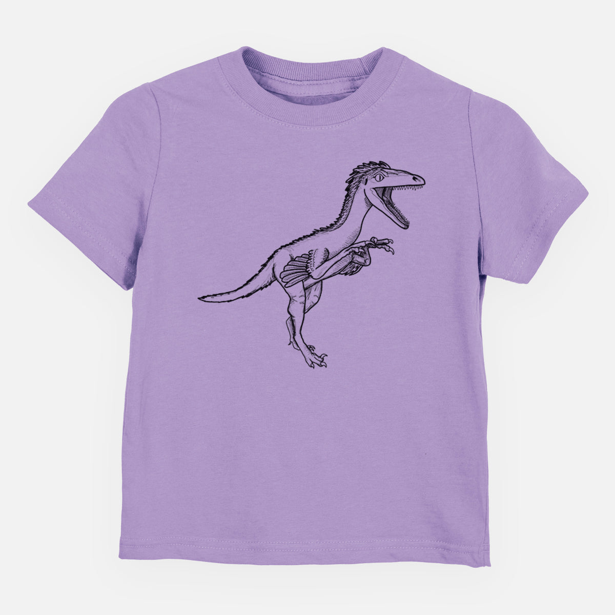 Lavender toddler t-shirt laid flat, printed with a black ink illustration of a Troodon dinosaur running.