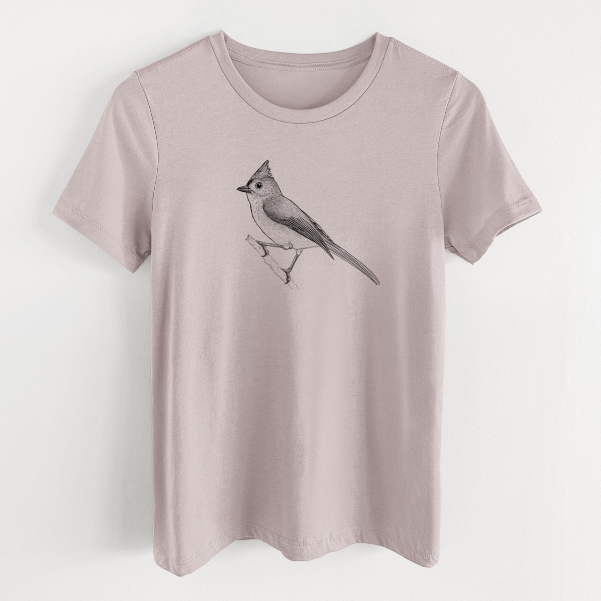 Pink gravel women's relaxed fit cotton t-shirt laid flat, printed with a detailed black ink sketch of a tufted titmouse perched on a branch.