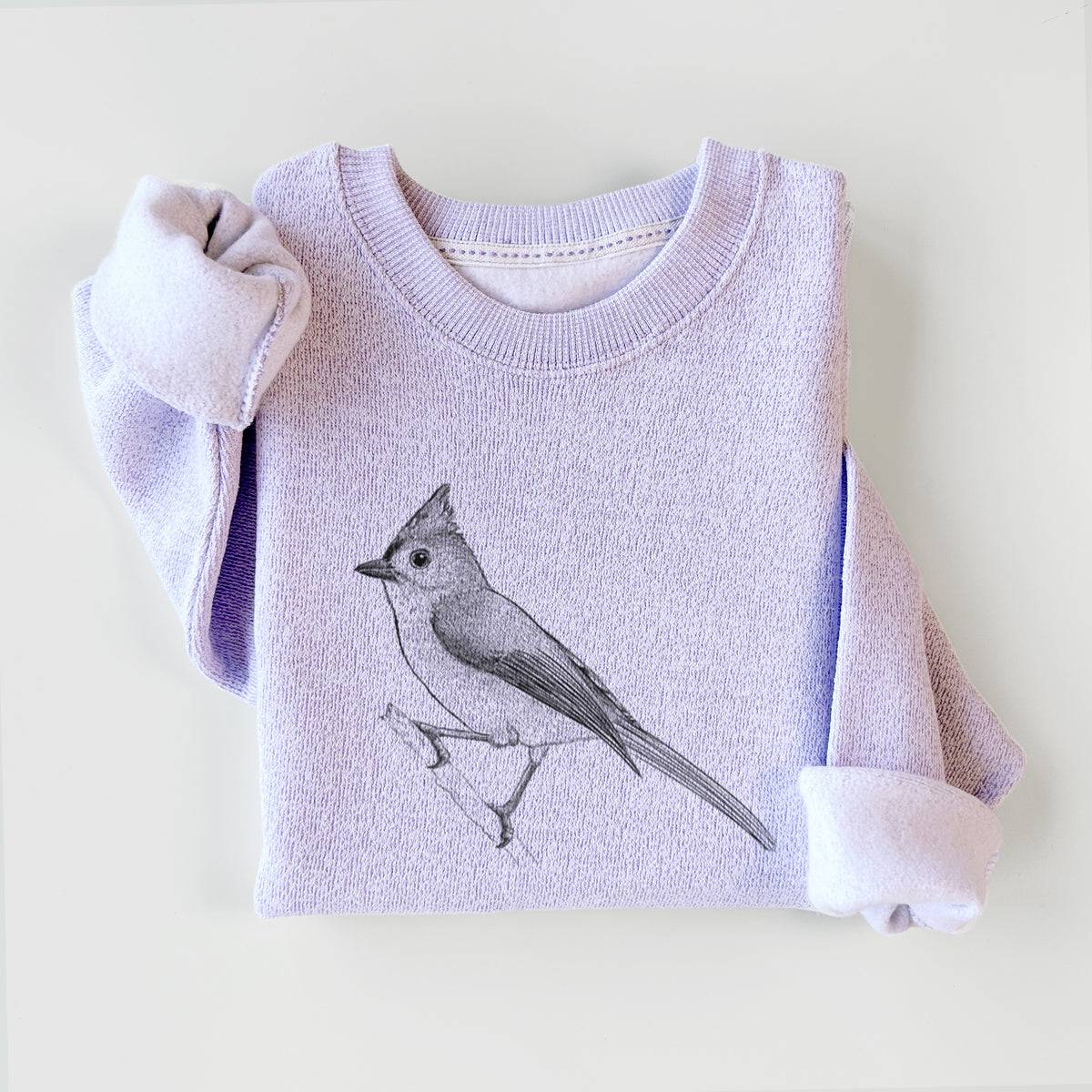 Ice purple knit sweatshirt printed with a detailed black ink sketch of a tufted titmouse perched on a branch, styled flat.