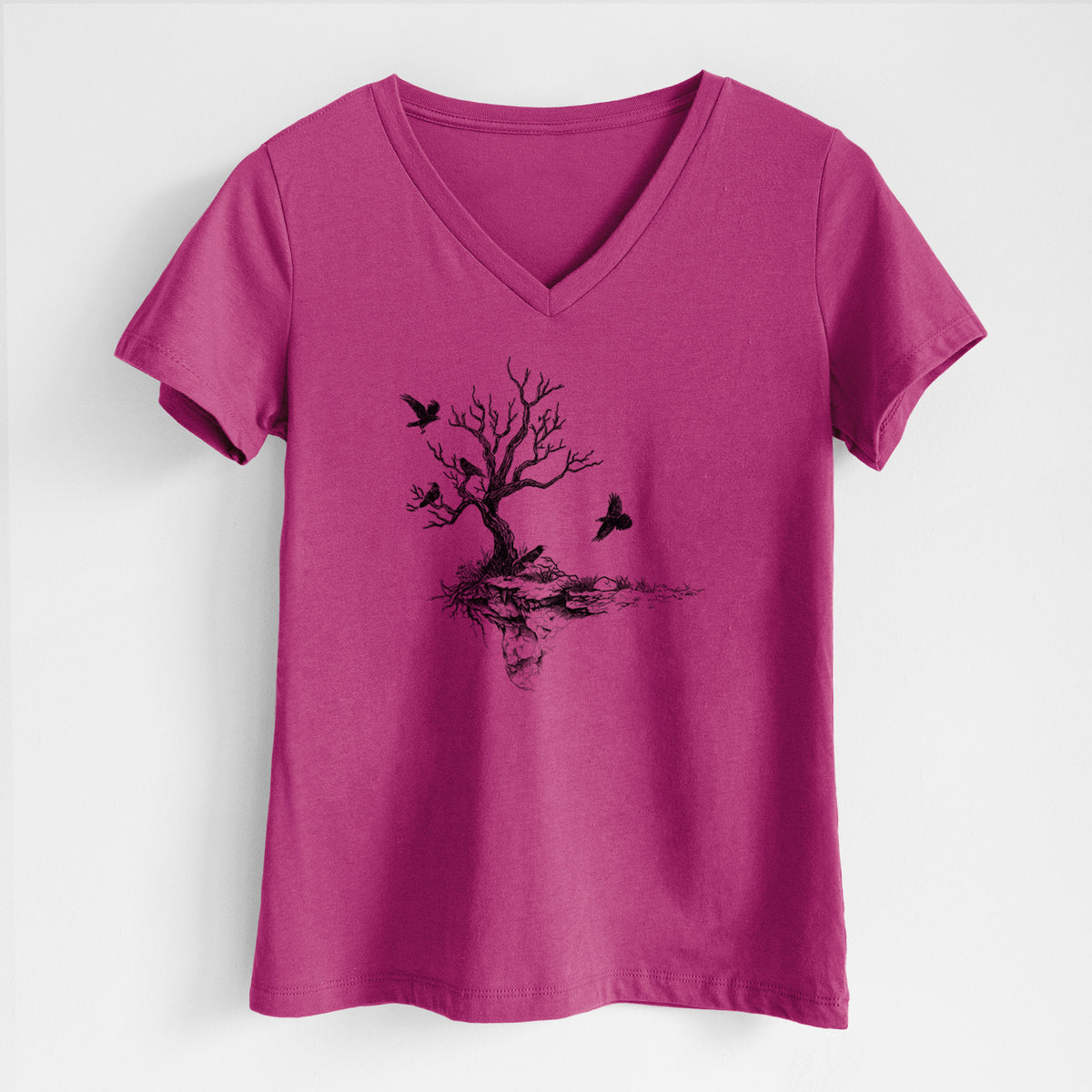 Berry pink women's relaxed fit cotton V-neck t-shirt laid flat, printed with a black ink illustration of a bare twisted tree on a small island with ravens flying around it.