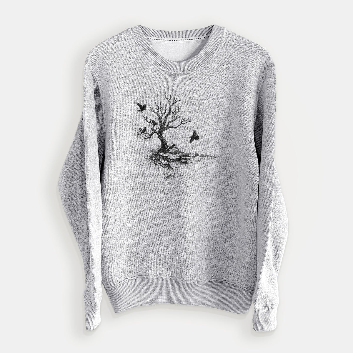Salt and pepper knit sweatshirt laid flat, printed with a black ink illustration of a bare twisted tree on a small island with ravens flying around it.